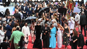 Representantes de O Agente Secreto, chegando para a exibição do filme, no Festival de Cannes, com a ministra Margareth Menezes, da Cultura. Foto: Antonin Thuillier/ANTONIN THUILLIER